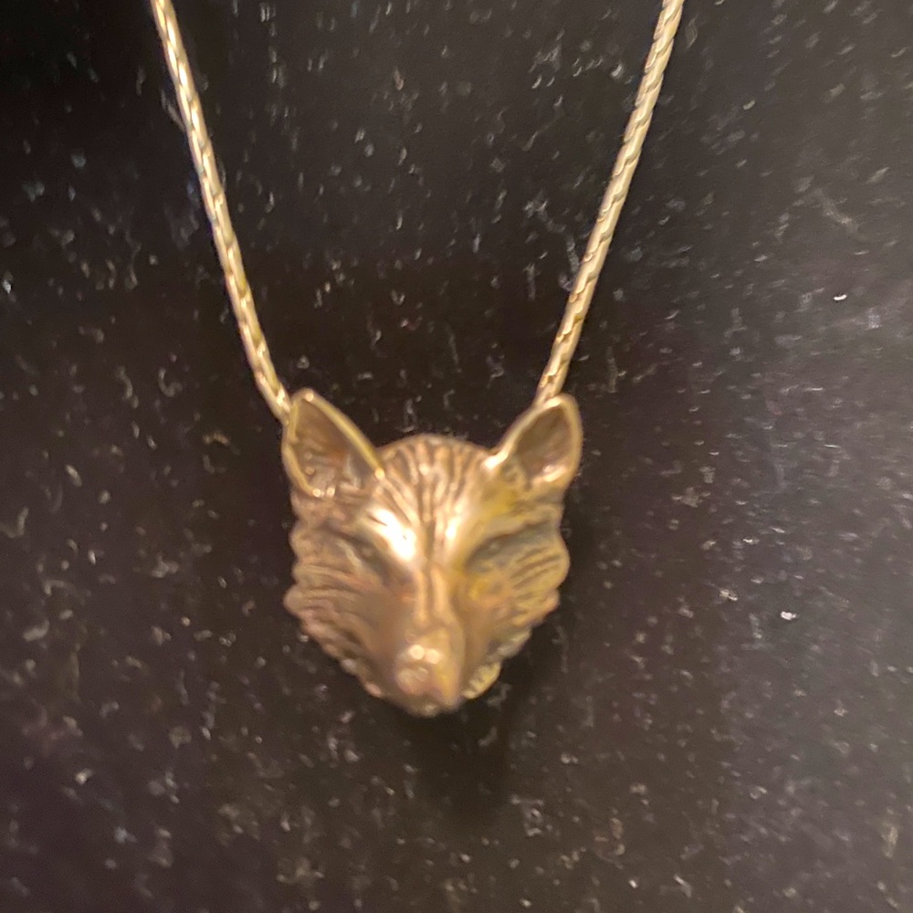 silver wolf’s head necklace
